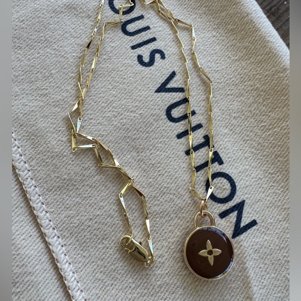 Luxury brown with gold tone LV skittle cross charm with gf 18 inch necklace.